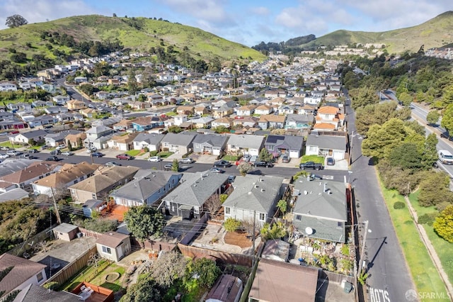 bird's eye view with a residential view and a mountain view