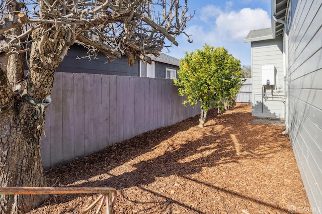 view of yard with fence