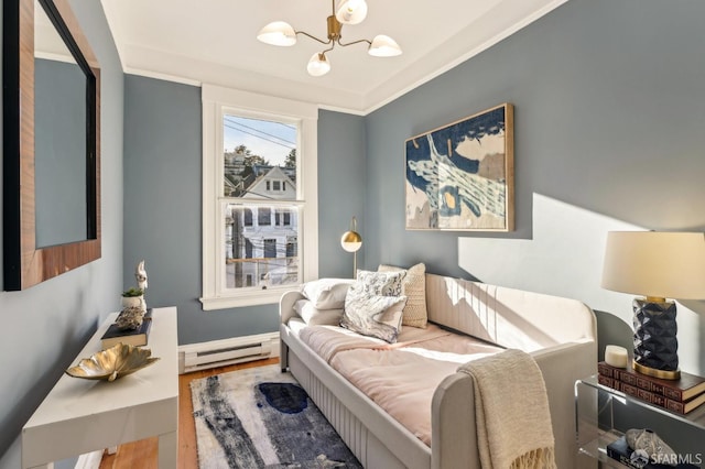 bedroom featuring a notable chandelier, a baseboard radiator, baseboards, and wood finished floors