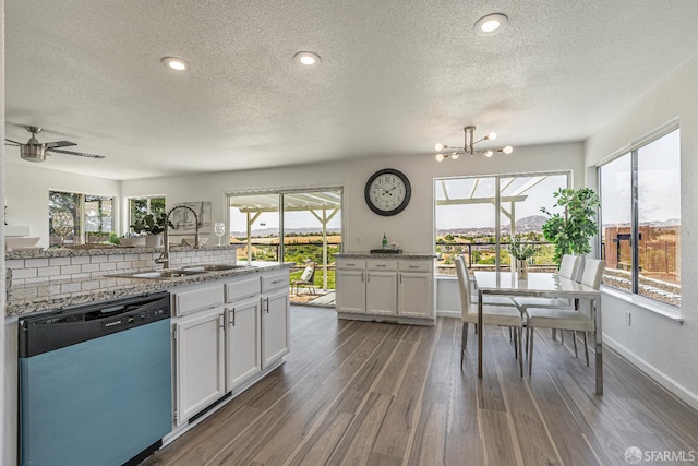 4156 N Amargosa Dr N, Antioch, CA 94531 - kitchen with dishwashing machine, a textured ceiling, white cabinetry, plenty of natural light, and dark wood finished floors