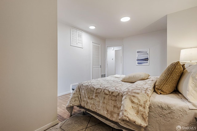 1567 44th Ave, San Francisco, CA 94122 - bedroom with baseboards and light wood-type flooring