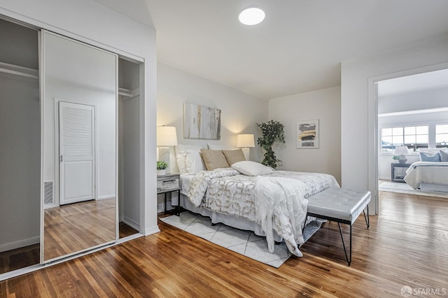 1567 44th Ave, San Francisco, CA 94122 - bedroom with wood finished floors and a closet