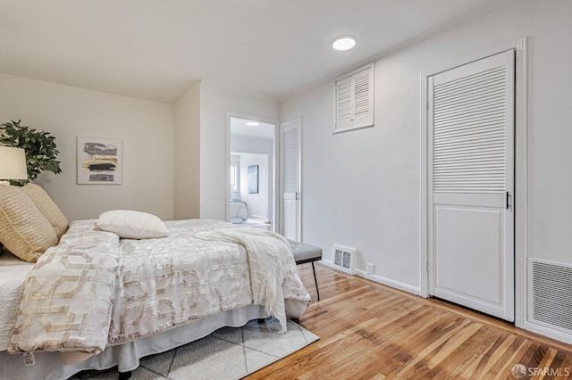 1567 44th Ave, San Francisco, CA 94122 - bedroom with light wood finished floors and baseboards
