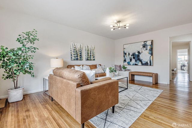 1567 44th Ave, San Francisco, CA 94122 - living room featuring light wood-style floors and a chandelier