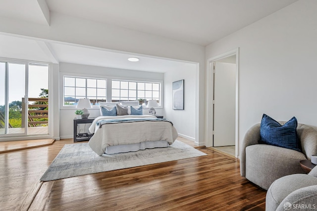 1567 44th Ave, San Francisco, CA 94122 - bedroom with multiple windows and wood finished floors