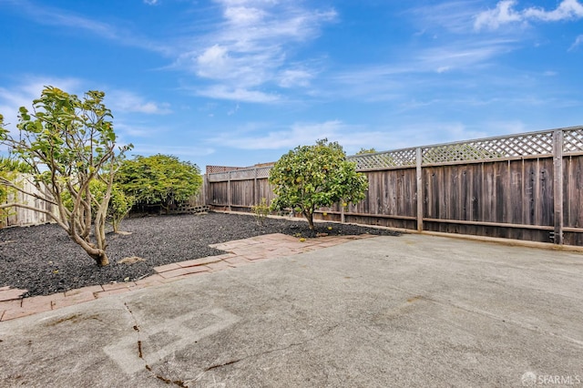 1567 44th Ave, San Francisco, CA 94122 - fenced backyard featuring a patio area