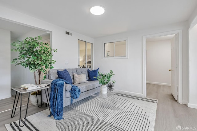1567 44th Ave, San Francisco, CA 94122 - living room featuring light wood finished floors and baseboards