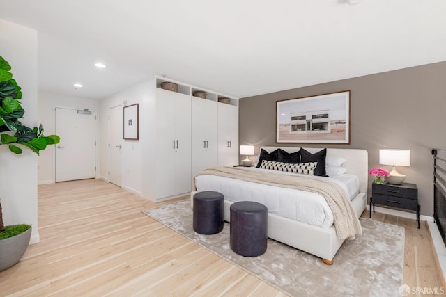 1970 Sutter St Unit 107, San Francisco, CA 94115 - bedroom with light wood-type flooring and recessed lighting
