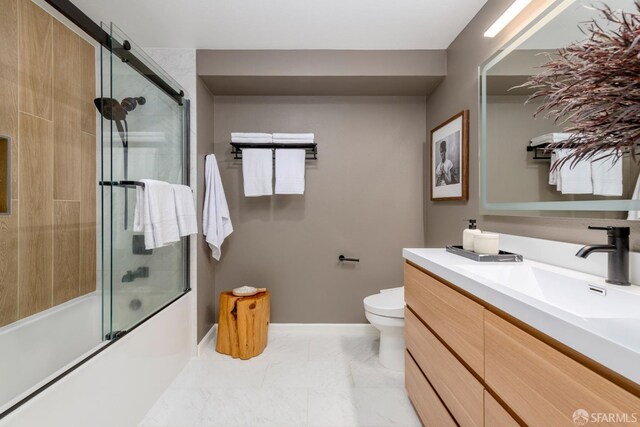 1970 Sutter St Unit 107, San Francisco, CA 94115 - full bathroom with vanity, enclosed tub / shower combo, and marble finish floors