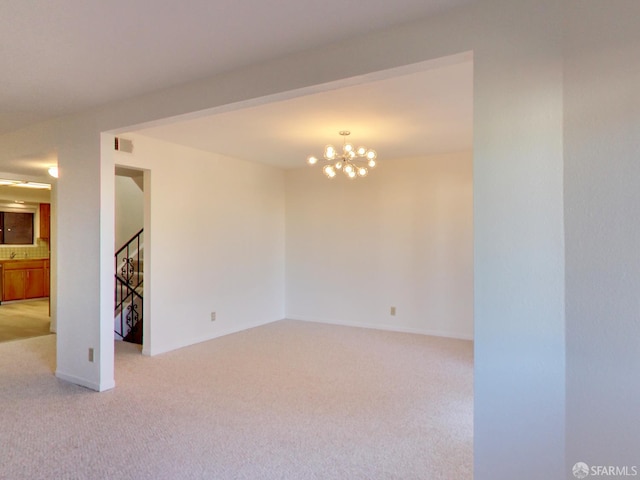 1279 41st Ave, San Francisco, CA 94122 - empty room with light colored carpet, a chandelier, and stairs