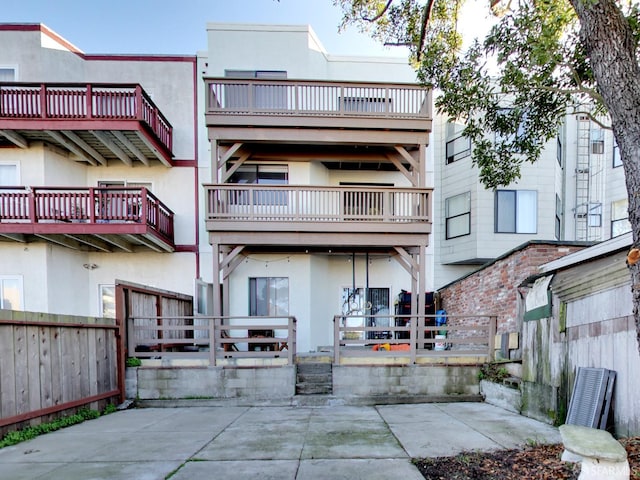 1279 41st Ave, San Francisco, CA 94122 - back of house featuring stucco siding and a patio