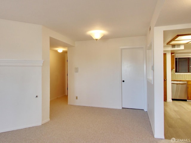 1279 41st Ave, San Francisco, CA 94122 - spare room with light carpet and baseboards