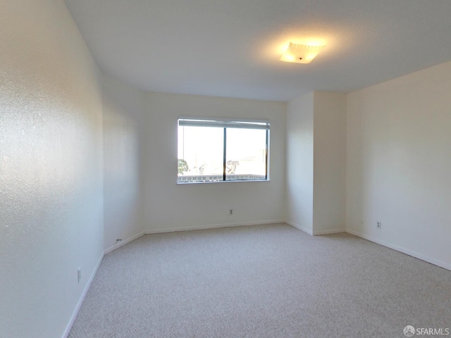1279 41st Ave, San Francisco, CA 94122 - empty room with light carpet and baseboards