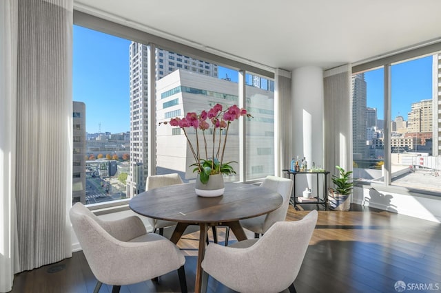 1 Hawthorne St Unit 12F, San Francisco, CA 94105 - dining area with floor to ceiling windows, a skyline view, and wood finished floors