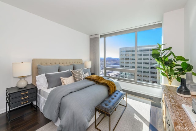 1 Hawthorne St Unit 12F, San Francisco, CA 94105 - bedroom featuring dark wood-type flooring and baseboards