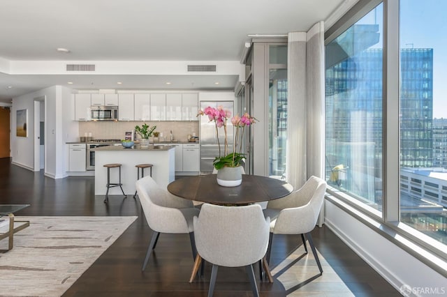 1 Hawthorne St Unit 12F, San Francisco, CA 94105 - dining area with dark wood-style flooring