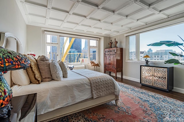 bedroom featuring multiple windows, coffered ceiling, and dark hardwood / wood-style flooring