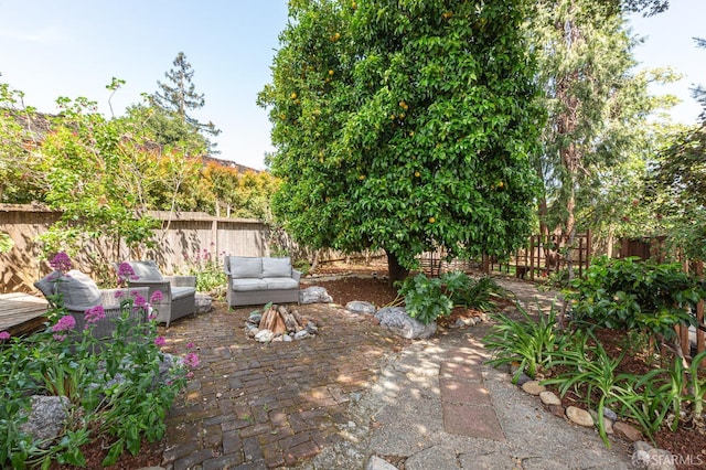 view of patio featuring a fenced backyard and an outdoor hangout area