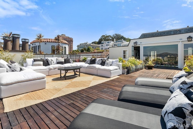 wooden deck with outdoor lounge area
