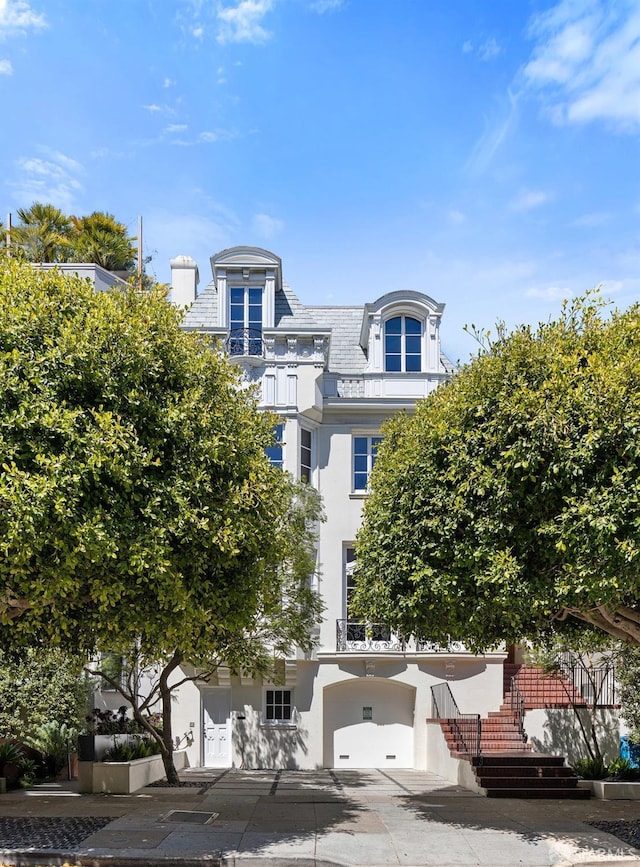 view of second empire-style home