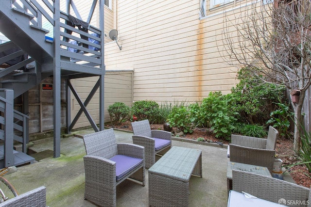 view of patio featuring stairs