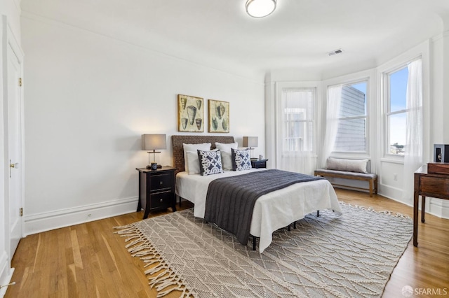1015 Ashbury St Unit 4, San Francisco, CA 94117 - bedroom featuring baseboards and light wood-style flooring