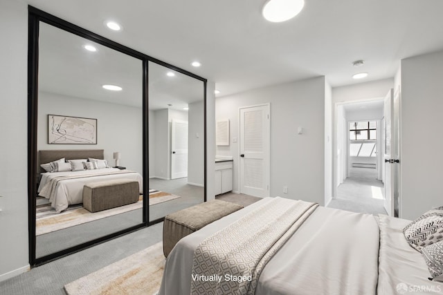 120 Landers St Unit D, San Francisco, CA 94114 - bedroom with light colored carpet, recessed lighting, a closet, and baseboards