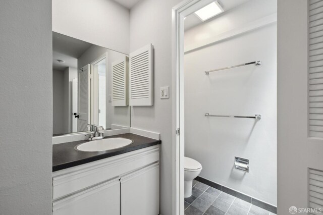 120 Landers St Unit D, San Francisco, CA 94114 - bathroom with toilet, vanity, and tile patterned flooring