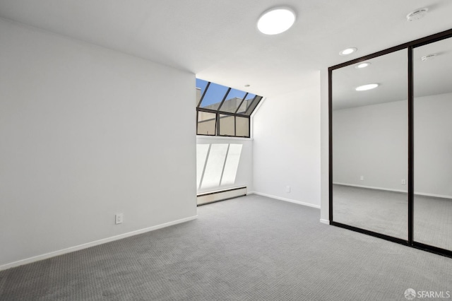 120 Landers St Unit D, San Francisco, CA 94114 - empty room with a baseboard radiator, carpet, baseboards, recessed lighting, and a smoke detector