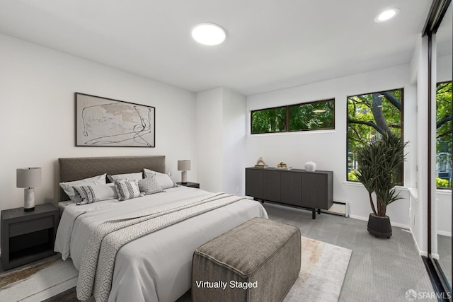 120 Landers St Unit D, San Francisco, CA 94114 - carpeted bedroom with baseboard heating, multiple windows, recessed lighting, and baseboards