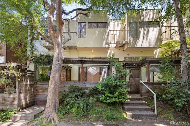 120 Landers St Unit D, San Francisco, CA 94114 - view of front facade featuring a balcony and stucco siding