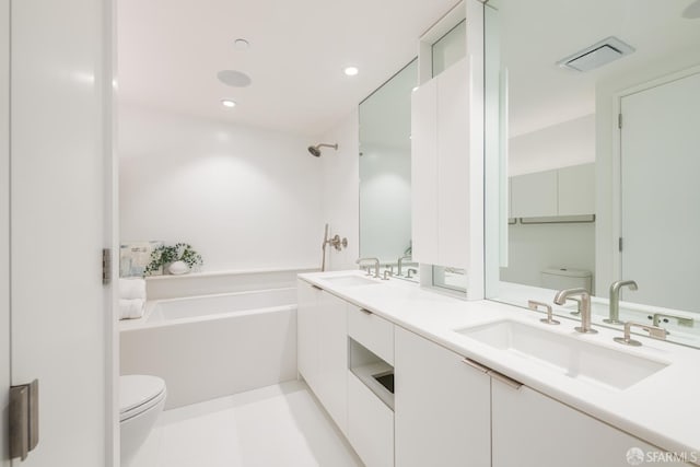 38 Bryant St Unit 405, San Francisco, CA 94105 - full bath with toilet, a bathtub, double vanity, and recessed lighting