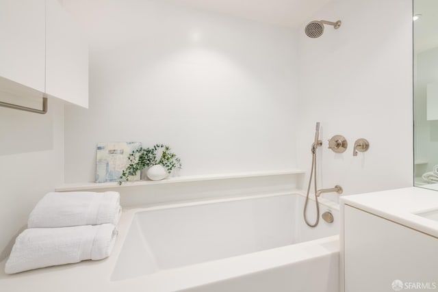 38 Bryant St Unit 405, San Francisco, CA 94105 - full bathroom featuring a tub to relax in and vanity