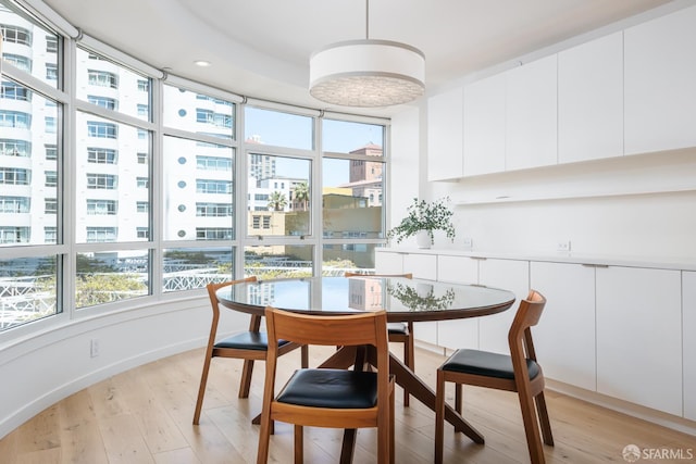 38 Bryant St Unit 405, San Francisco, CA 94105 - dining space with light wood-style flooring and recessed lighting