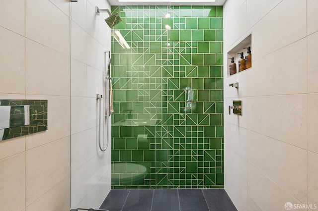 1515 Van Dyke Ave, San Francisco, CA 94124 - bathroom with tile walls, a tile shower, and tile patterned floors