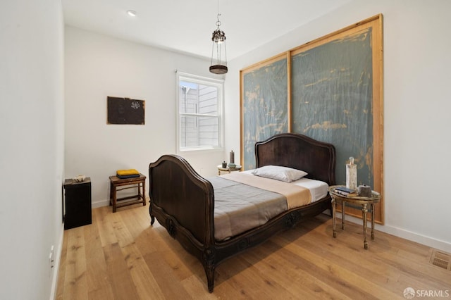 1515 Van Dyke Ave, San Francisco, CA 94124 - bedroom with light wood finished floors and baseboards