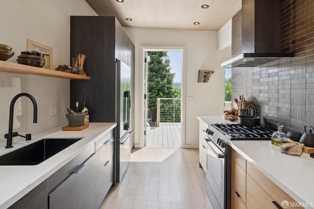 1515 Van Dyke Ave, San Francisco, CA 94124 - kitchen featuring wall chimney exhaust hood, gas range oven, modern cabinets, and recessed lighting