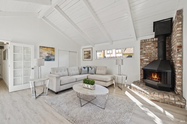 7 Hearthstone Ct, San Rafael, CA 94903 - living room with wood finished floors, beam ceiling, a wood stove, wood ceiling, and high vaulted ceiling