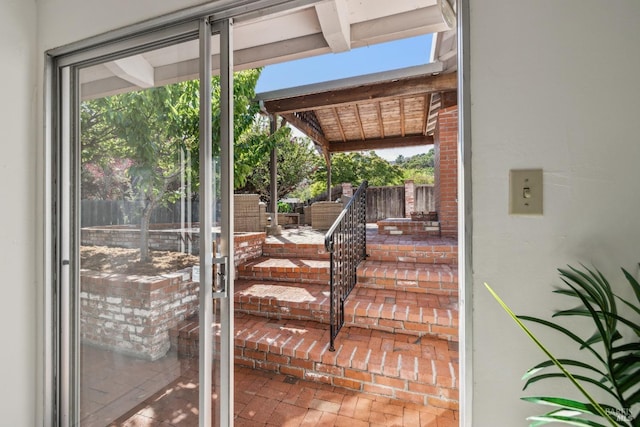 7 Hearthstone Ct, San Rafael, CA 94903 - doorway to outside featuring brick floors and healthy amount of natural light