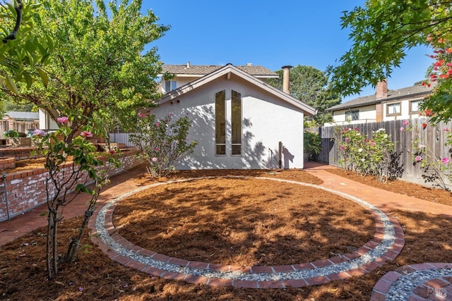 7 Hearthstone Ct, San Rafael, CA 94903 - rear view of property with stucco siding and fence