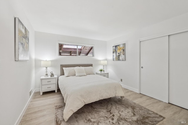 7 Hearthstone Ct, San Rafael, CA 94903 - bedroom featuring light wood-style floors, a closet, and baseboards