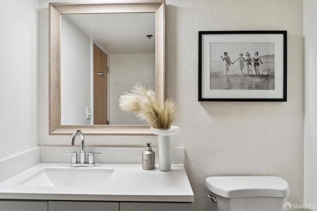 175 Bluxome St Unit 202, San Francisco, CA 94107 - half bath with vanity and a textured wall
