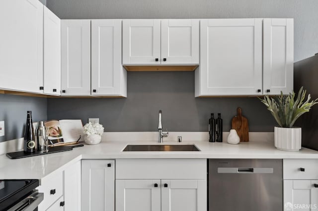175 Bluxome St Unit 202, San Francisco, CA 94107 - kitchen featuring dishwasher, white cabinetry, and light countertops