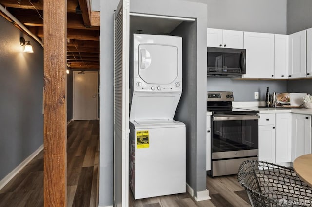 175 Bluxome St Unit 202, San Francisco, CA 94107 - laundry area with stacked washer and clothes dryer and dark wood-style flooring