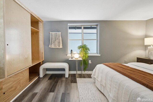 175 Bluxome St Unit 202, San Francisco, CA 94107 - bedroom with wood finished floors and baseboards