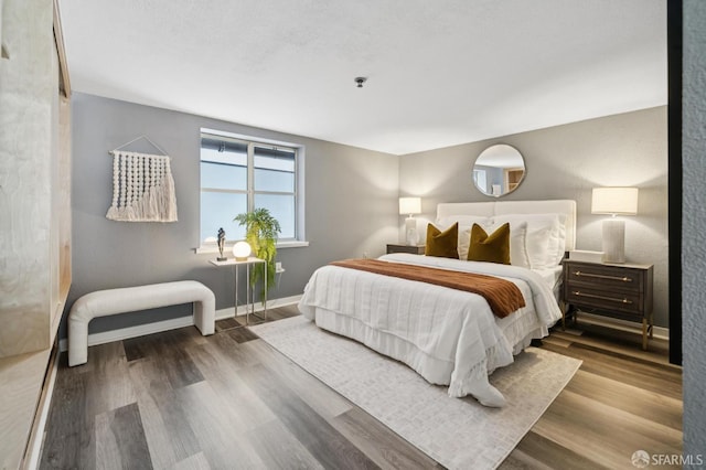 175 Bluxome St Unit 202, San Francisco, CA 94107 - bedroom with wood finished floors and baseboards