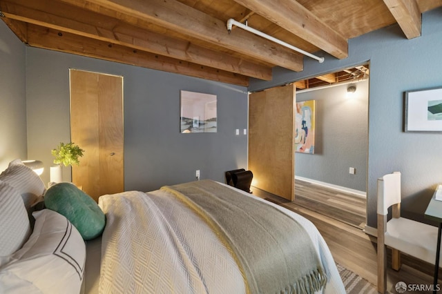 175 Bluxome St Unit 202, San Francisco, CA 94107 - bedroom with wood finished floors and a wooden ceiling with exposed beams