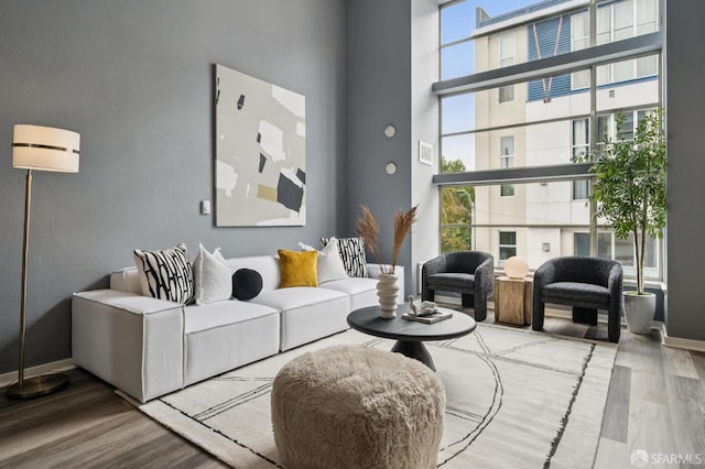 175 Bluxome St Unit 202, San Francisco, CA 94107 - living room with wood finished floors, plenty of natural light, and a towering ceiling