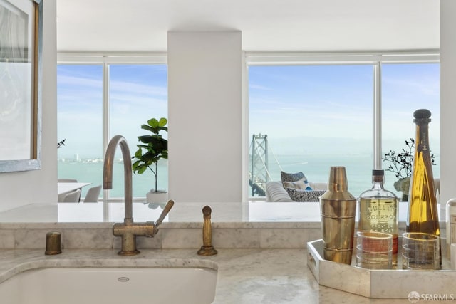 details featuring a sink and a water view