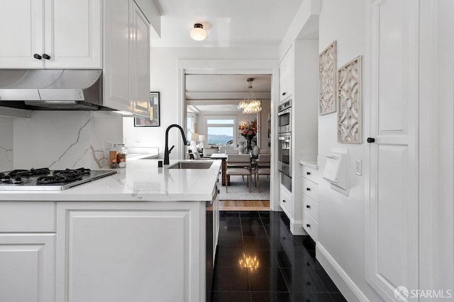 1998 Vallejo St Unit 2, San Francisco, CA 94123 - kitchen featuring gas cooktop, wall chimney range hood, and white cabinets